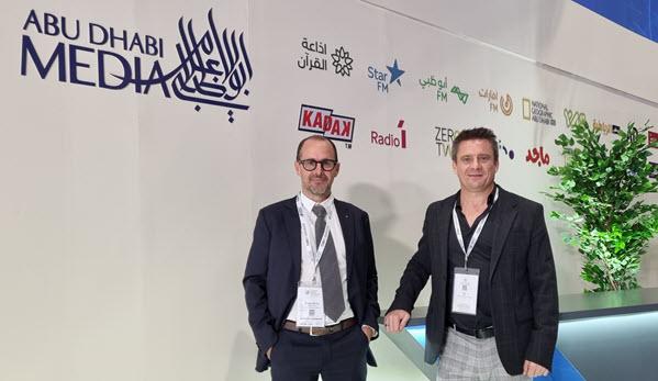 Pascal Metral (L) and Chrys Poulain (R) on the Abu Dhabi Media booth at the Global Media Congress 2022